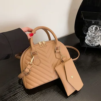 Популярната тази година чанта 2023, новата модерна дамска чанта през рамо за пътуване до работа, лесна чанта във формата на миди