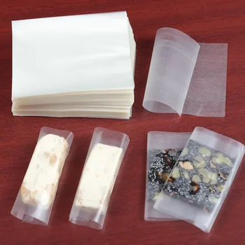 Ядивната залепваща оризова хартия практически хартия за опаковане на кенди глазура годни за хартия за нуга прозрачна хартия за опаковане на бонбони